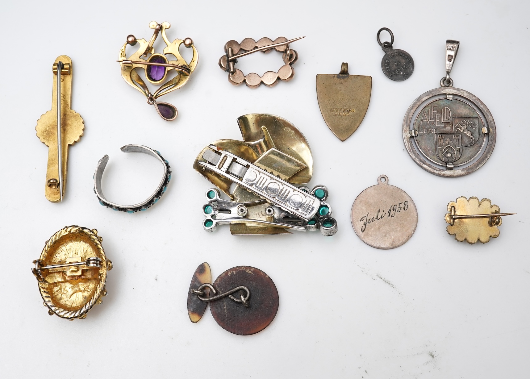 A small group of assorted collectables and jewellery including a Dunhill lighter, 64mm, a George V silver and enamel small compact, silver thimble, two Victorian garnet set brooches, an Edwardian 9ct, amethyst and seed p